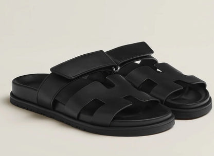 Black leather H-strap sandals side view